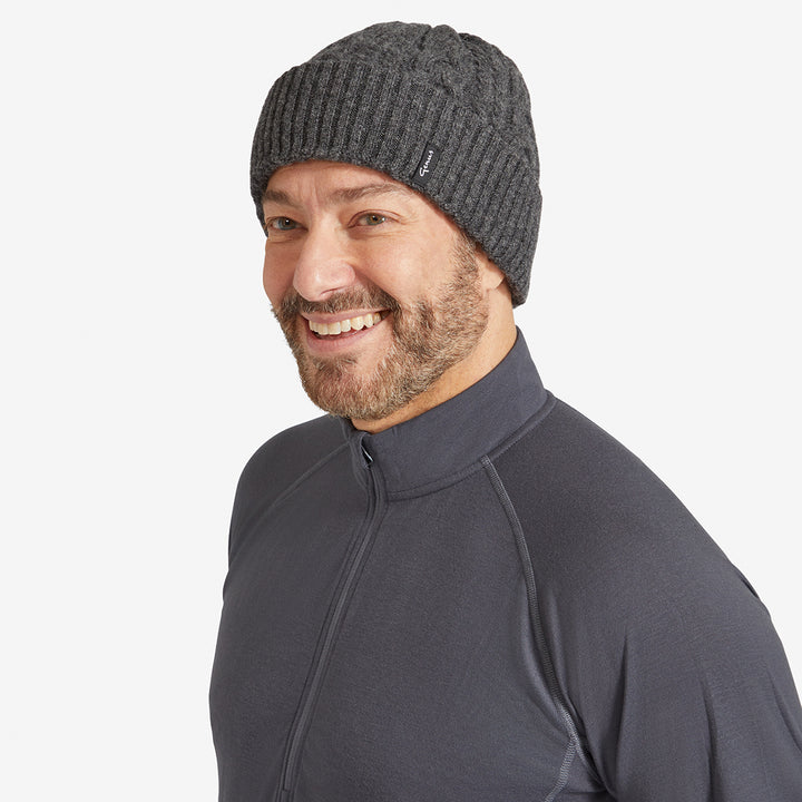 Man wearing a Dark Earth Genus Cable Knit Merino Wool Hat  