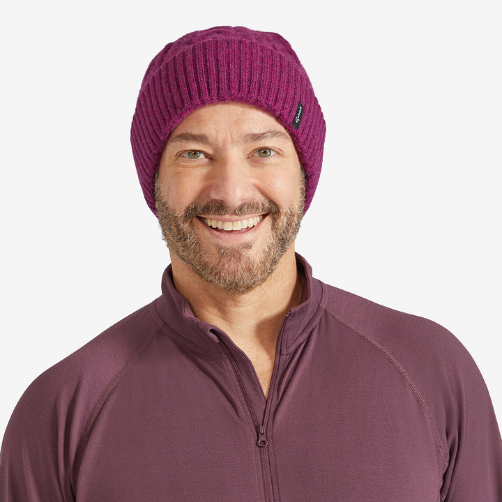 Man wearing a Tayberry Red Genus Cable Knit Merino Wool Hat 