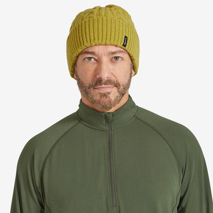 Man wearing a Achemilla Green Genus Cable Knit Merino Wool Hat 