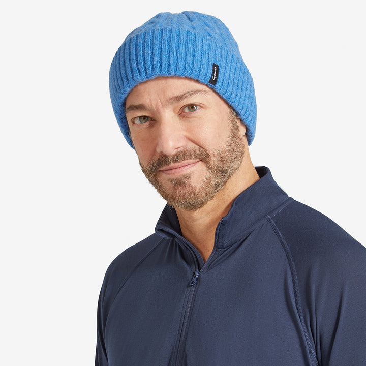 Man wearing a Pacific Blue Genus Cable Knit Merino Wool Hat 