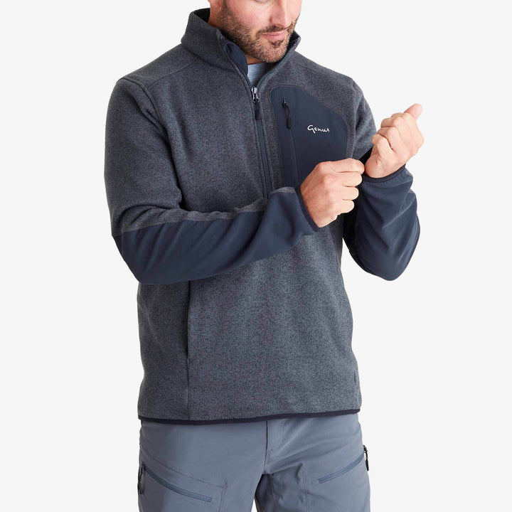 Genus Men's Dixter Gardening Pullover on a man holding the sleeves