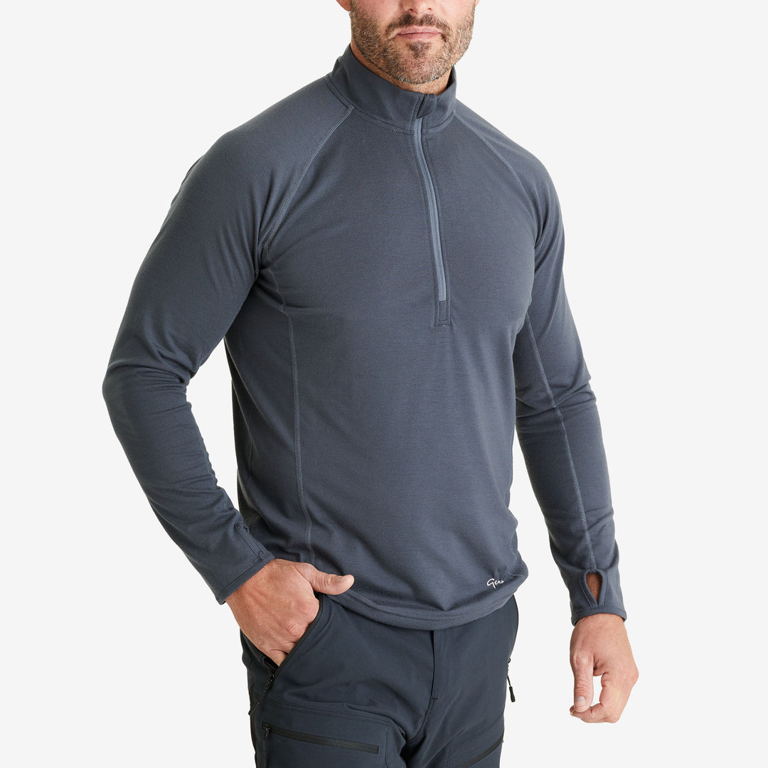 Man wearing a Genus Men's Charcoal Eden Zip-Neck Top