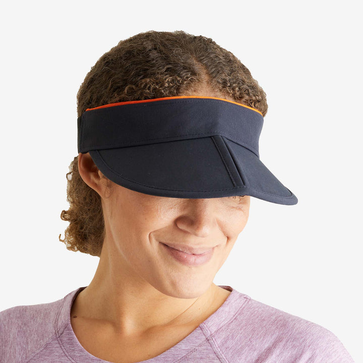 Woman looking down wearing a Genus Summer Gardening Visor 