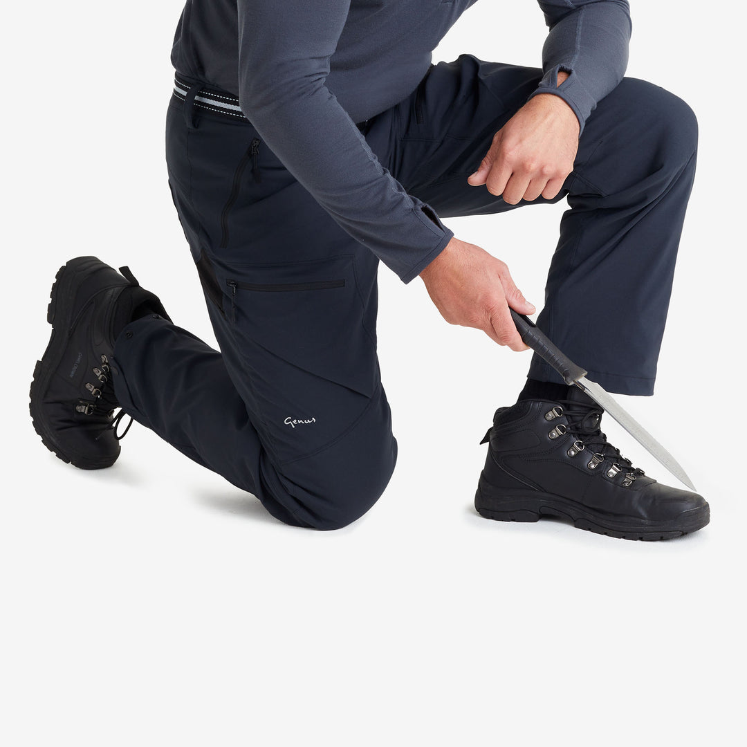 Man wearing a pair of Genus Men's Waterproof Gardening Trousers Midnight