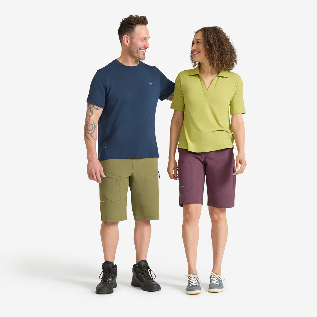 Woman wearing a Genus Soft Lime Eden Collared Tee with a man