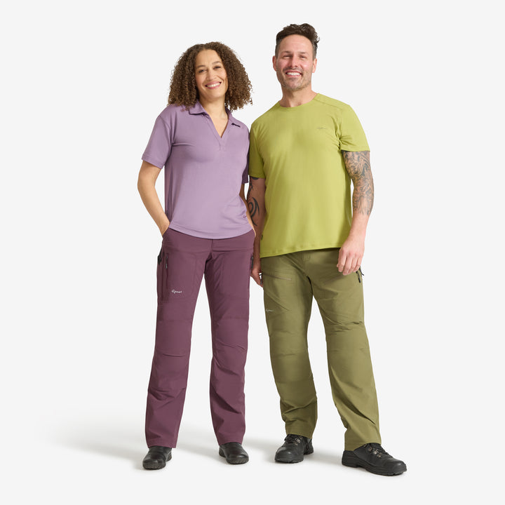 Woman wearing a pair of Genus mulberry summer trousers with a man