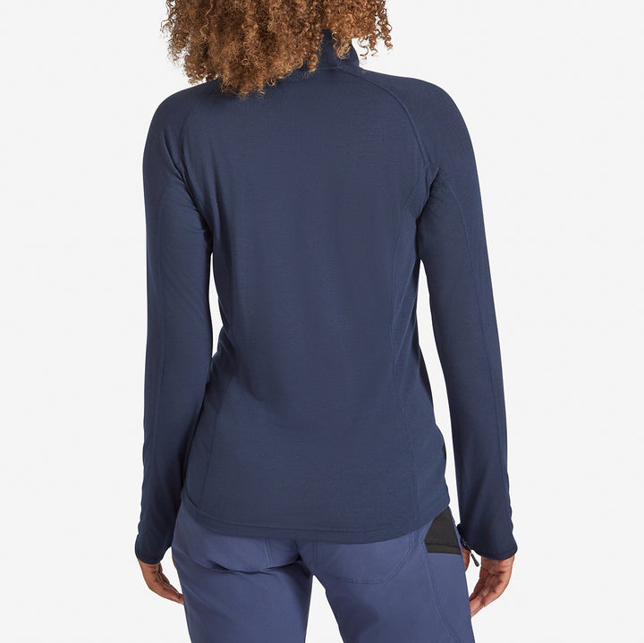 Back view of a Genus Women's Marine Blue Eden Zip neck Top