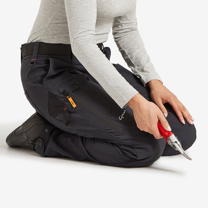 Woman on her knees in the Genus Women's Gardening Propants