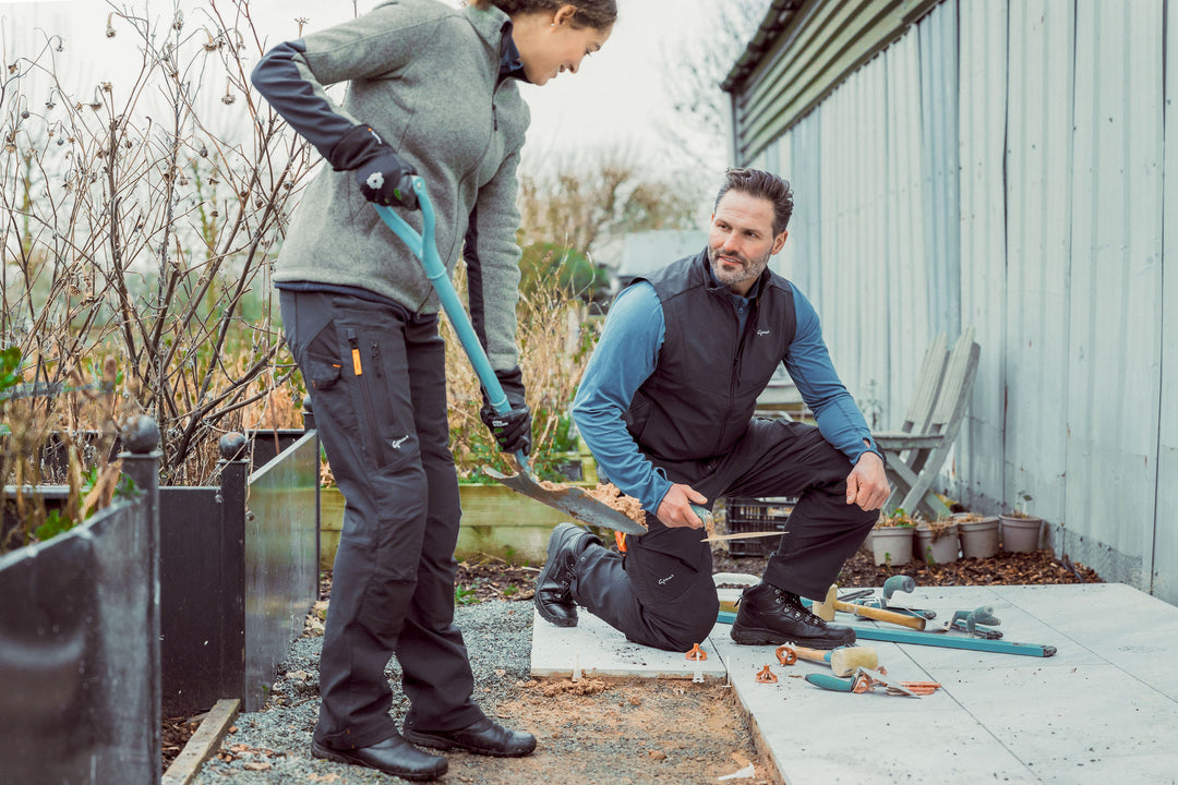 Woman wearing the Genus Women's Gardening Propants in the garden