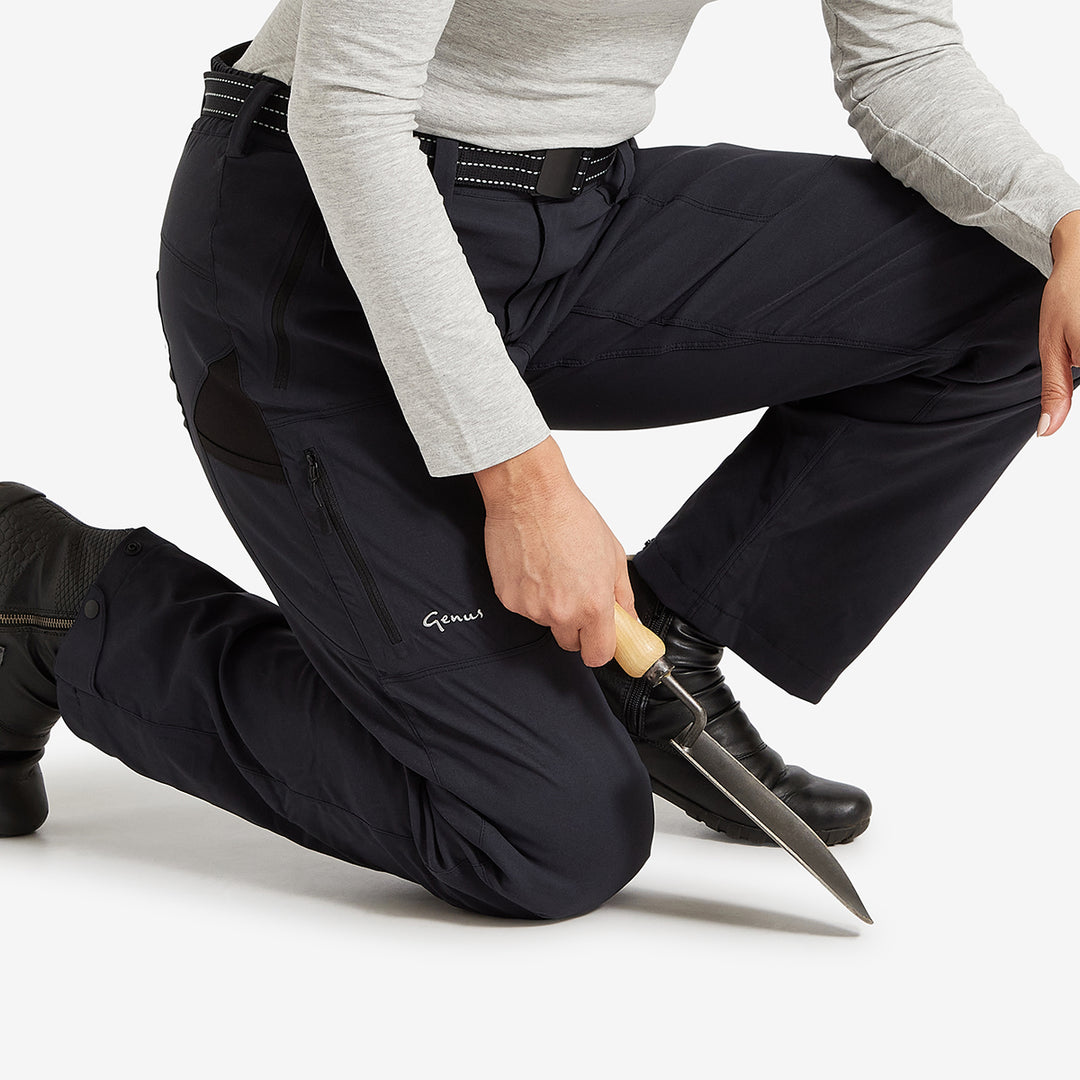 Woman wearing a pair of Genus Women's Waterproof Gardening Trousers Midnight