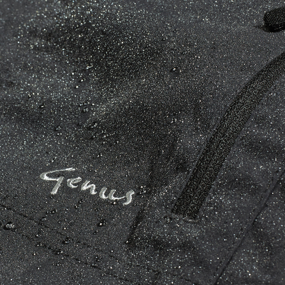 Water droplets on a pair of Genus Women's Waterproof Gardening Trousers Midnight