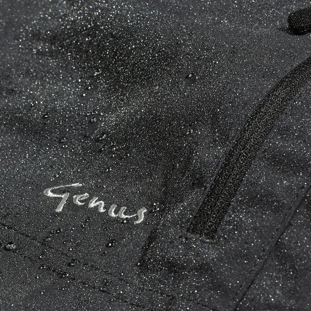 Water droplets on a pair of Genus Women's Waterproof Gardening Trousers Midnight